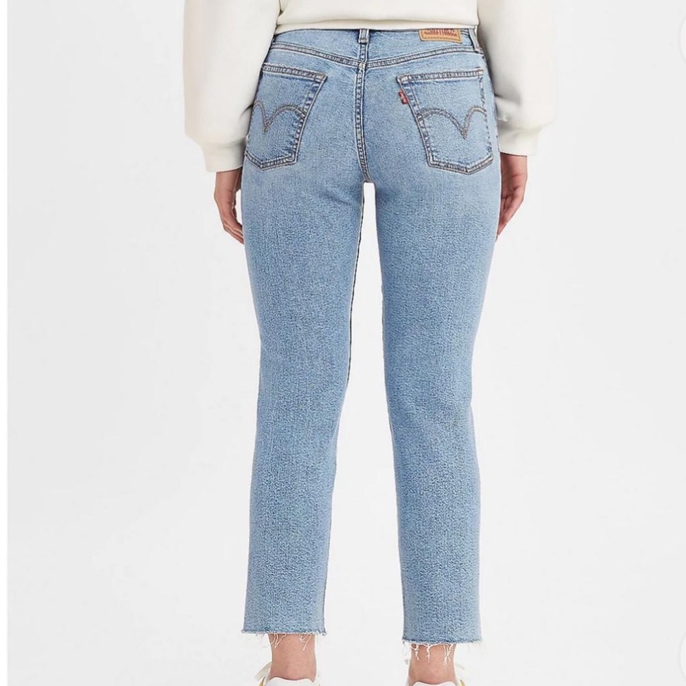 Levi Jeans wedgie straight in “medium indigo destructed” size 26 x 28.